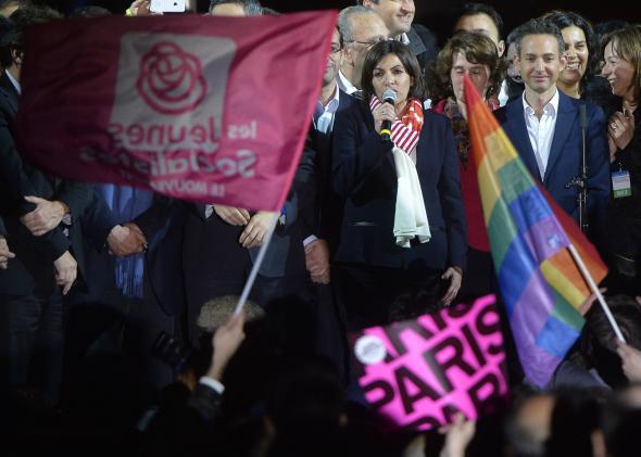 Anne Hidalgo and a rainbow flag
