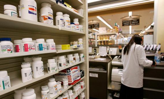 A pharmacist works at a Safeway Pharmacy in Great Falls, Virginia, July 29, 2009. 