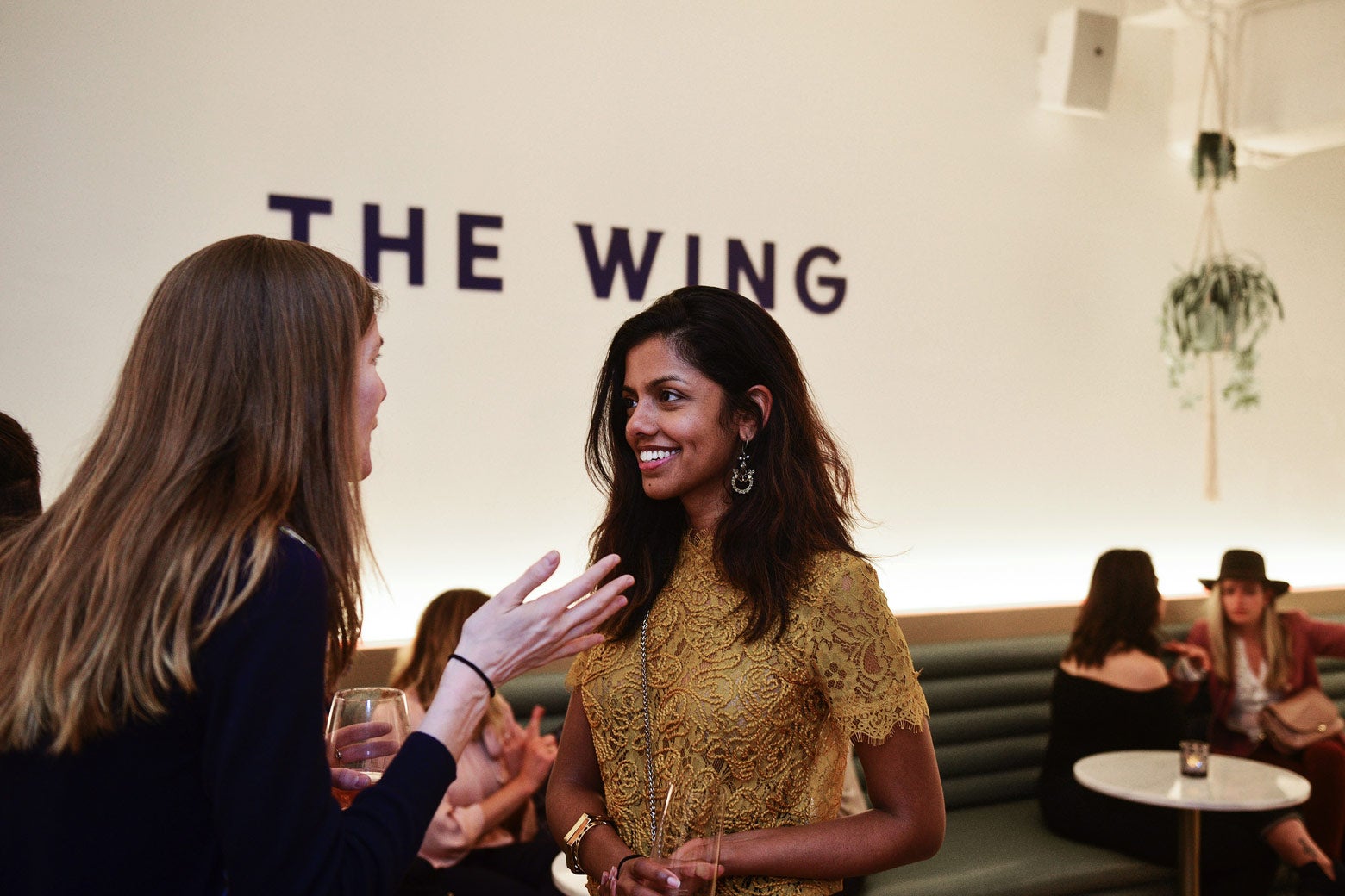 Guests are seen during the Wing D.C. opening celebration in Georgetown on Tuesday in Washington.