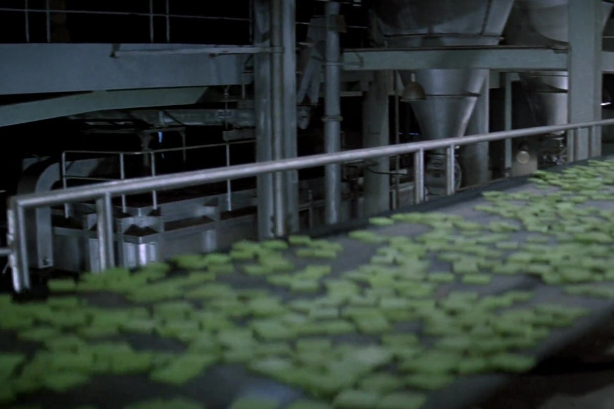 A still from the film Soylent Green, showing a conveyor belt transporting Soylent Green.