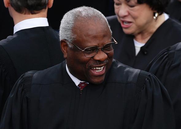 U.S. Supreme Court Justice Clarence Thomas arrives for inauguration ceremonies on the West front of the U.S. Capitol in Washington, January 21, 2013.  