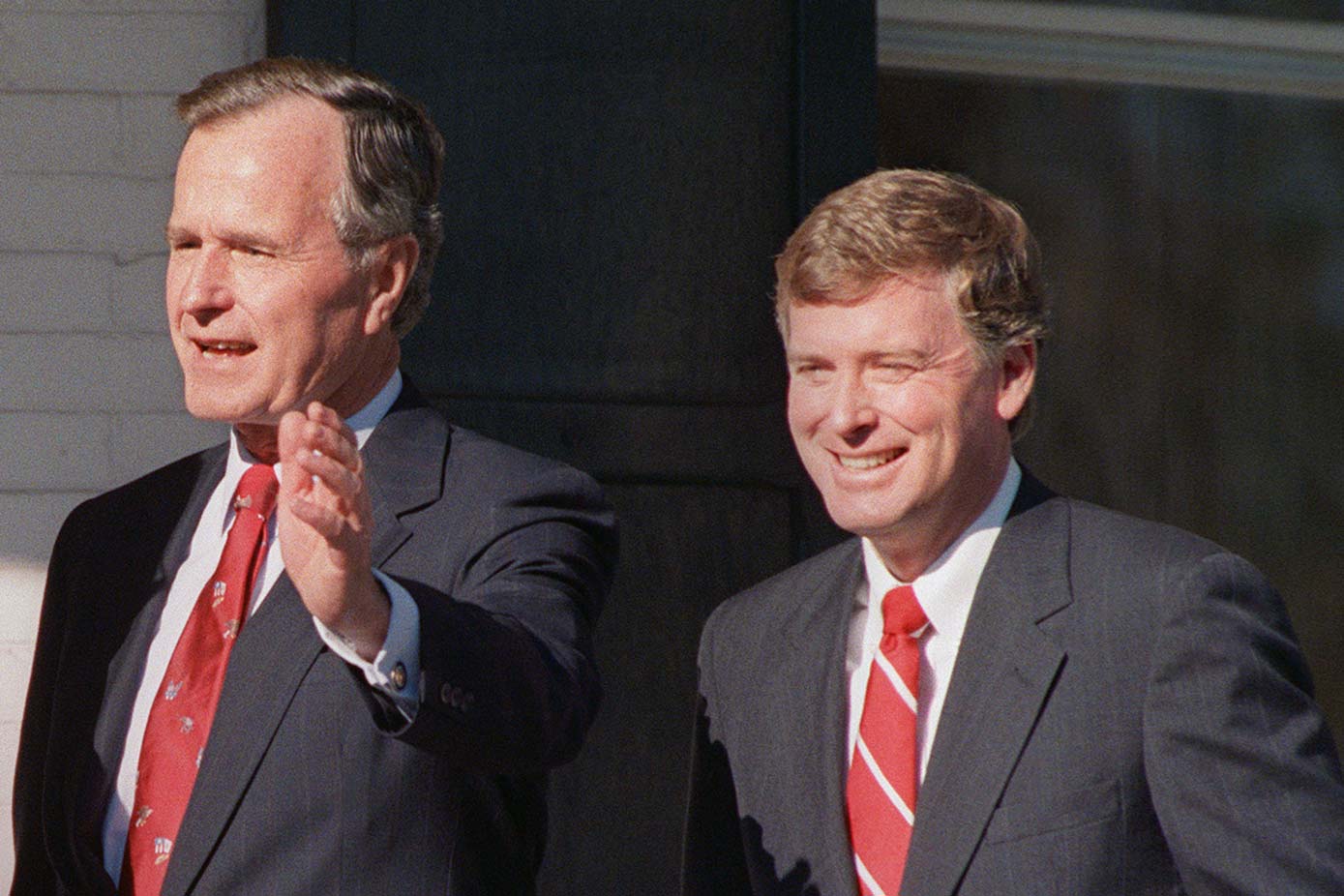 Historic photo of Bush and Quayle outside in Washington in the 80s.
