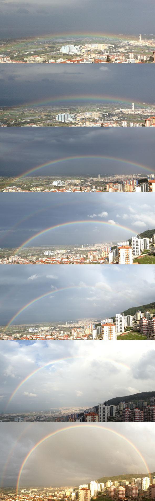 A rainbow rises