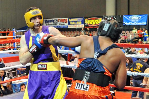 Tamerlan Tsarnaev (L) fights Lamar Fenner (R) during the 201-pound division boxing match during the 2009 Golden Gloves National Tournament of Champions May 4, 2009 in Salt Lake City, Utah.