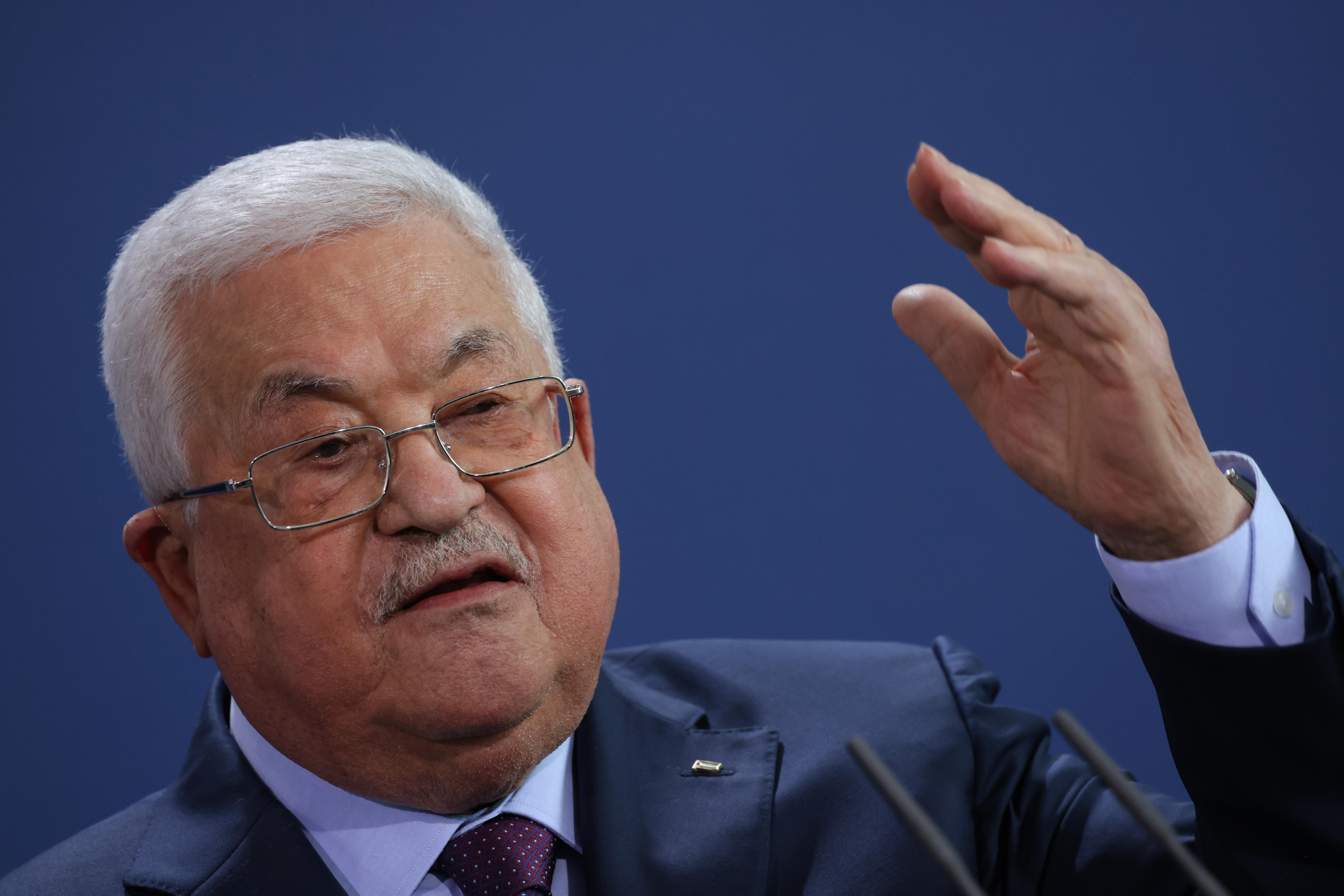 Mahmoud Abbas gestures while speaking.