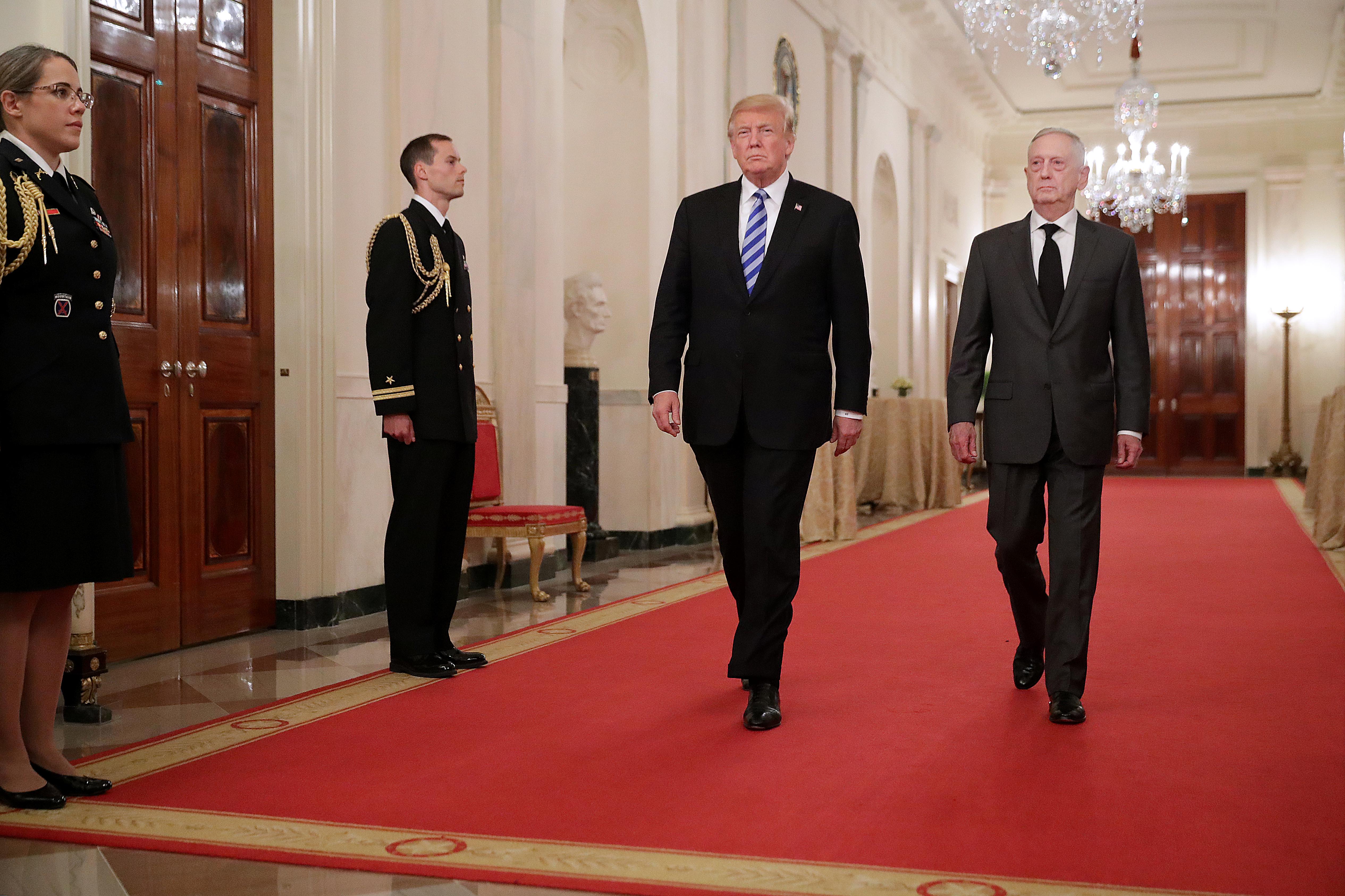 U.S. President Donald Trump (L) and Defense Secretary James Mattis arrive for an event commemorating the 35th anniversary of attack on the Beirut Barracks in the East Room of the White House October 25, 2018.