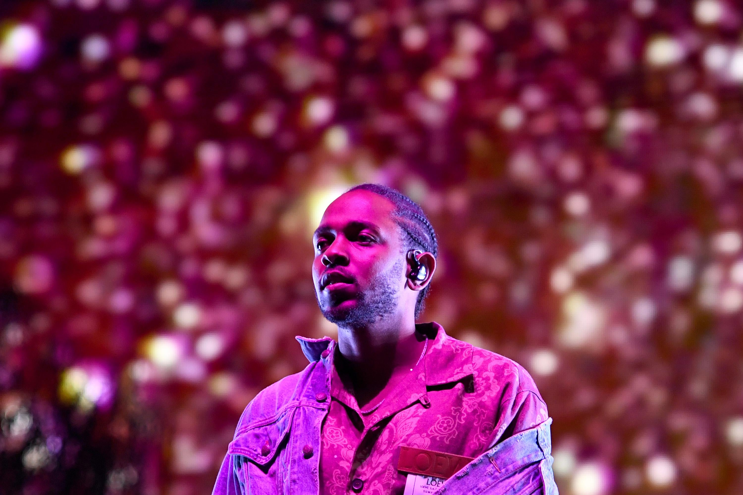 Kendrick Lamar performs onstage during Coachella.