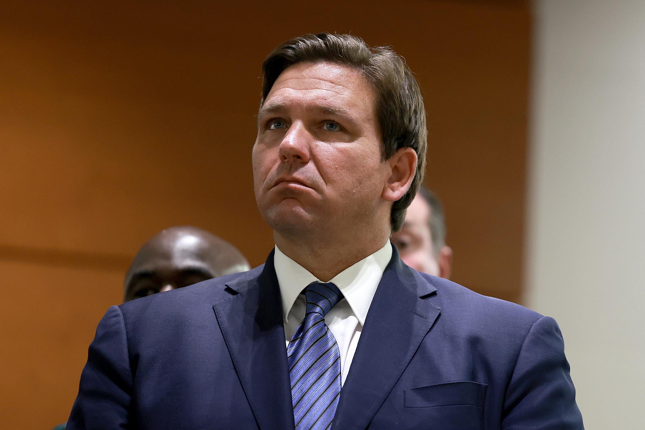 Ron DeSantis looking up, questioningly