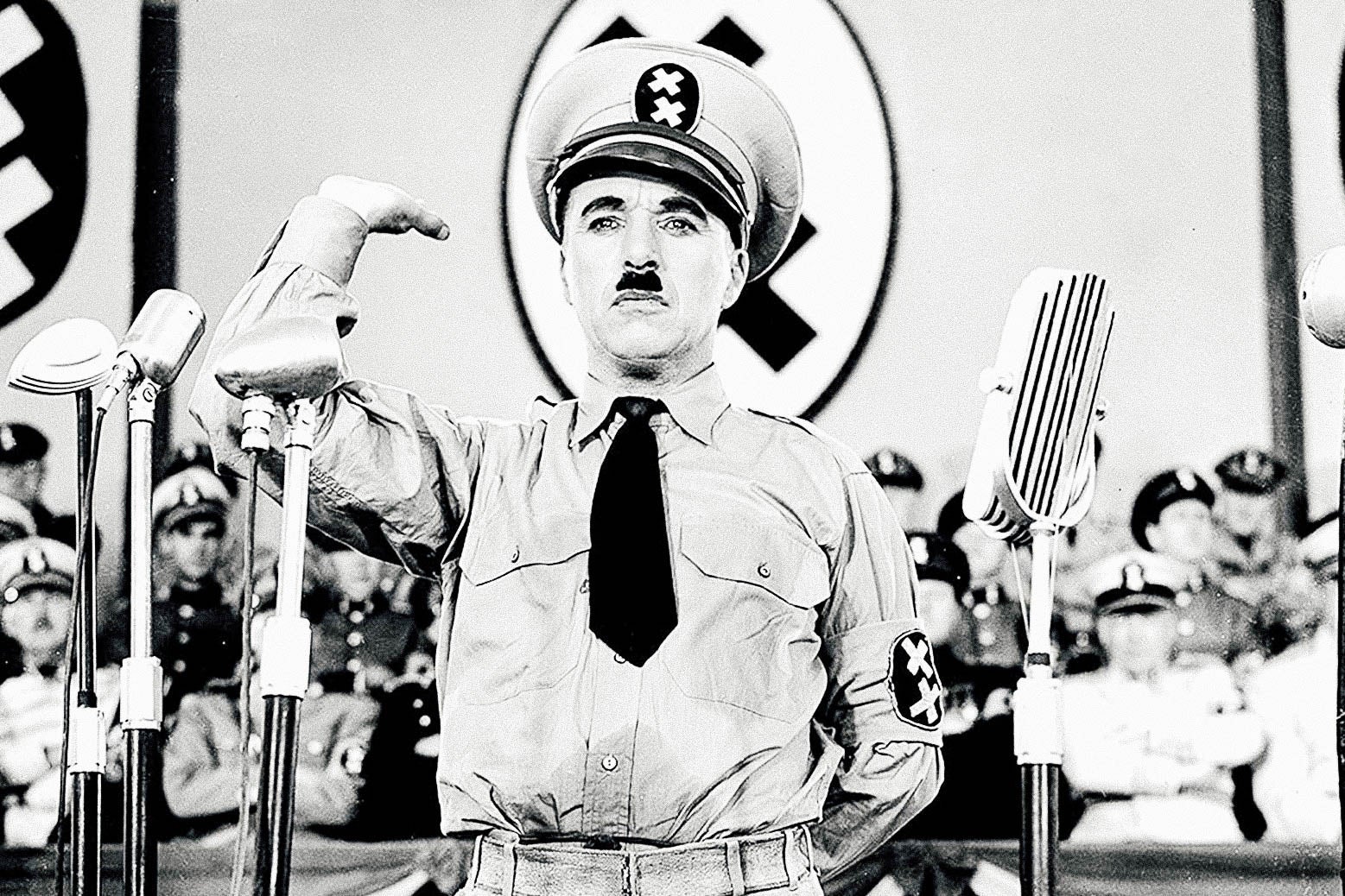 Charlie Chaplin as Hitler in The Great Dictator.