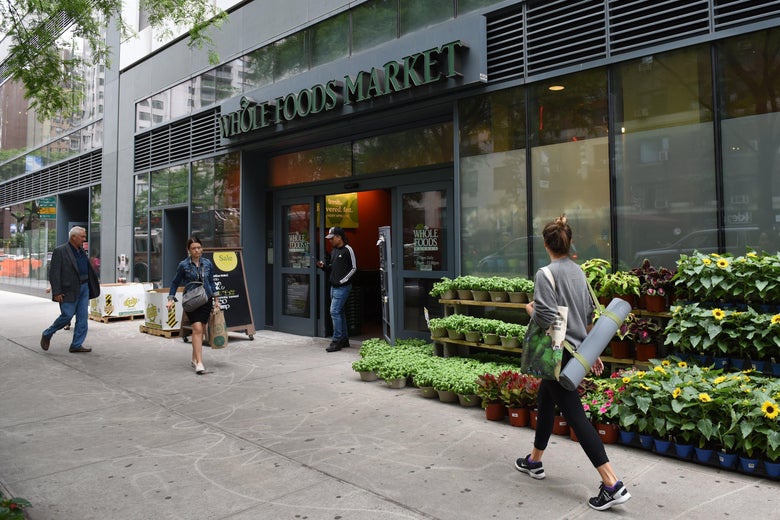 The Whole Foods Market in Midtown New York is seen on June 16, 2017. 
Amazon is once again shaking up the retail sector, with the announcement Friday it will acquire upscale US grocer Whole Foods Market, known for its pricey organic options,  in a deal that underscores the online giant's growing influence in the economy. / AFP PHOTO / TIMOTHY A. CLARY        (Photo credit should read TIMOTHY A. CLARY/AFP/Getty Images)
