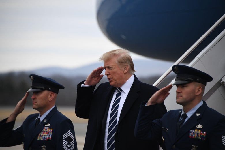 President Donald Trump salutes upon arrival at Greenbrier Valley Airport in Lewisburg, West Virginia on February 1, 2018.