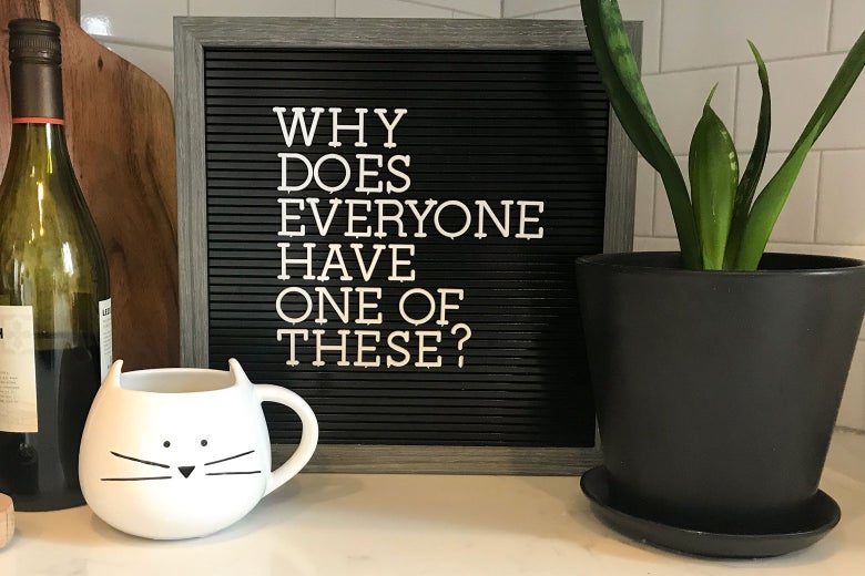 A letterboard with an important question