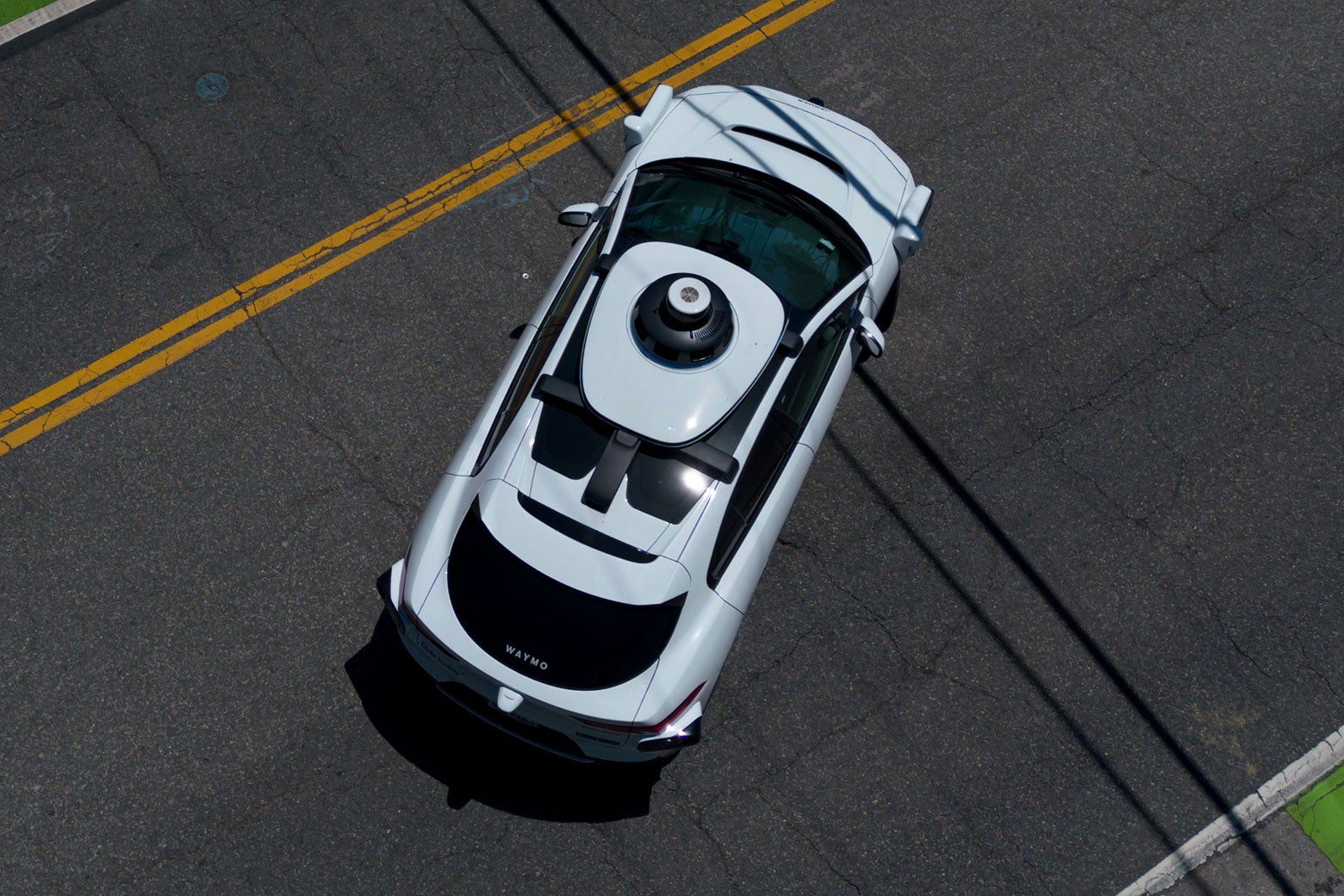 A Waymo car is seen from above.