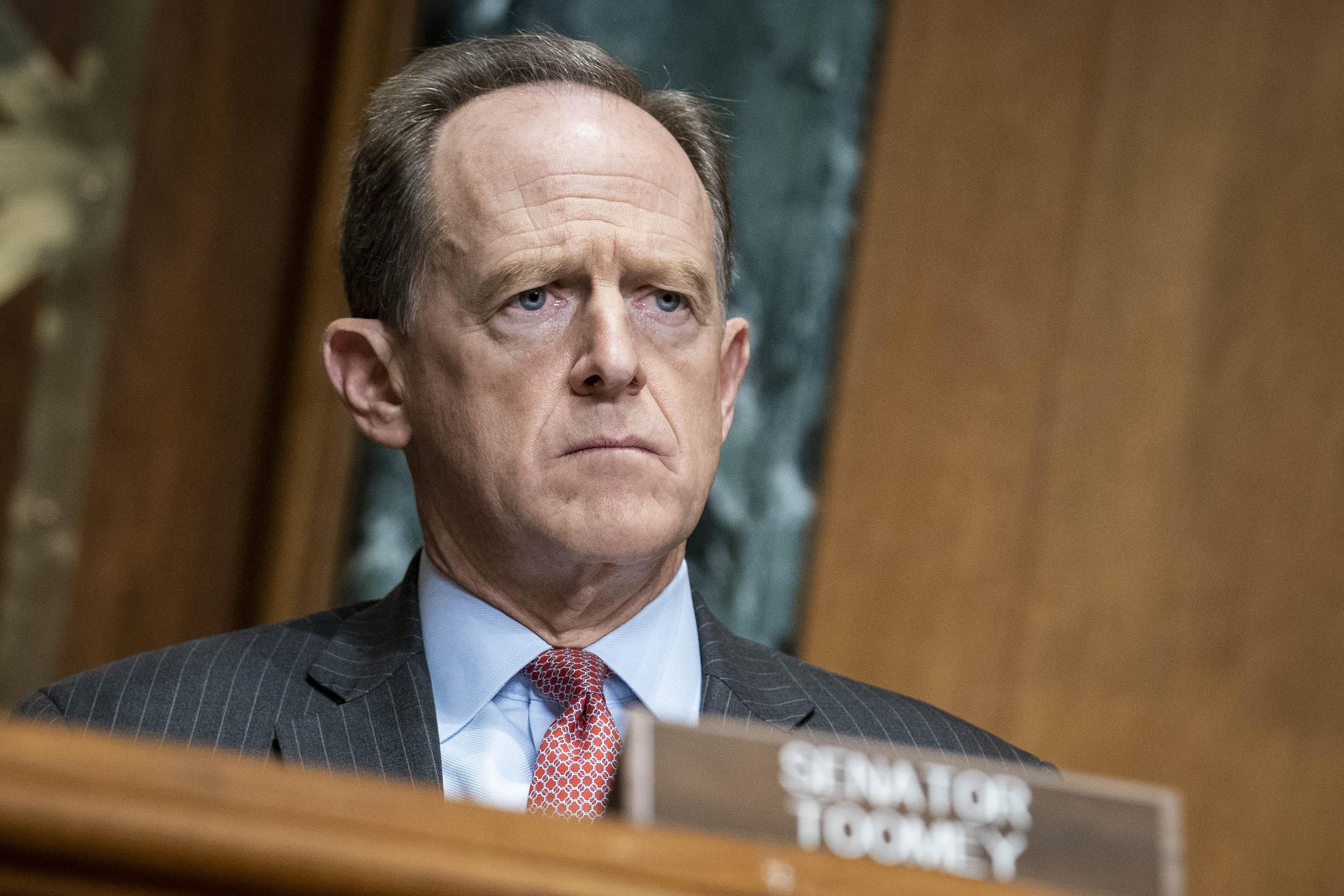 Pat Toomey sits in a hearing on Capitol Hill