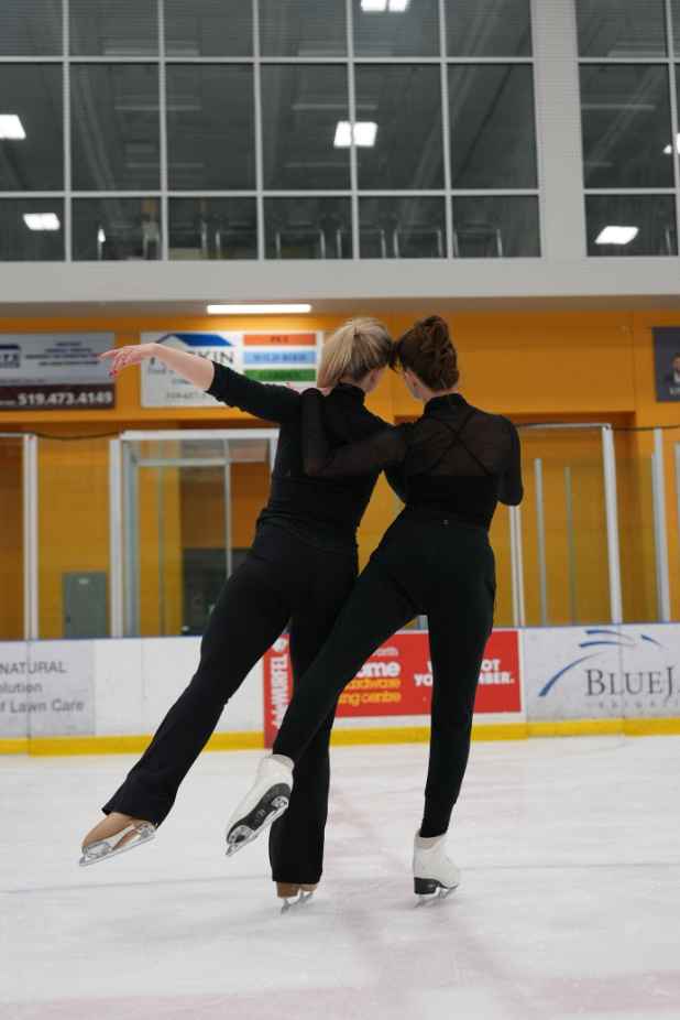 Hubbell and Papadakis skate together.