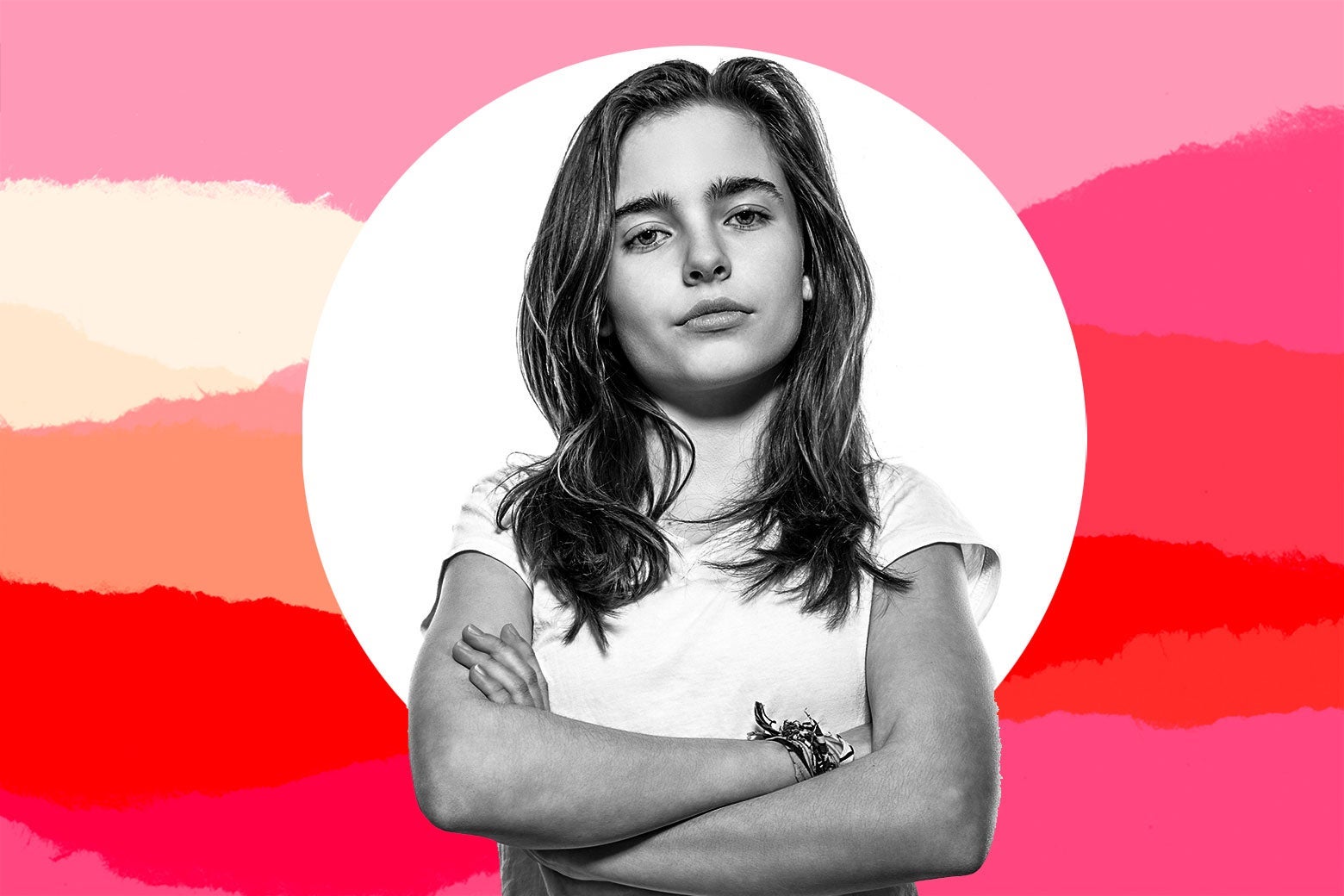 A teenage girl crosses her arms defiantly.