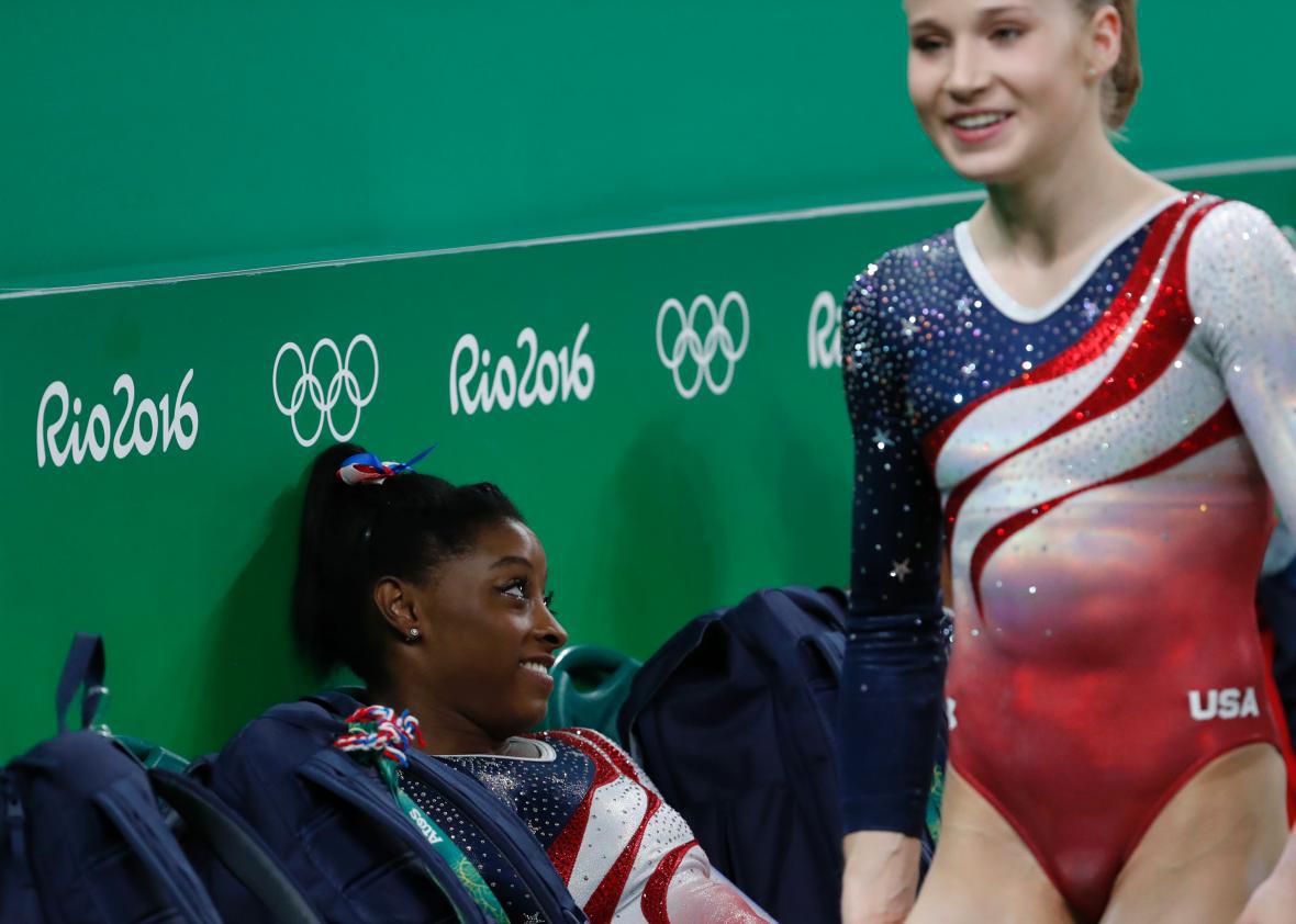 U.S. gymnasts Madison Kocian, right, and Simone Biles during the women’s te...