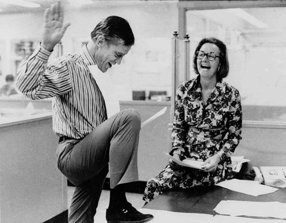 Katharine Graham, then publisher of the Washington Post, and Executive Editor Benjamin C. Bradlee look over reports of the 6 to 3 Supreme Court decision which permitted the paper to publish stories based on the secret Pentagon study of the Vietnam War.