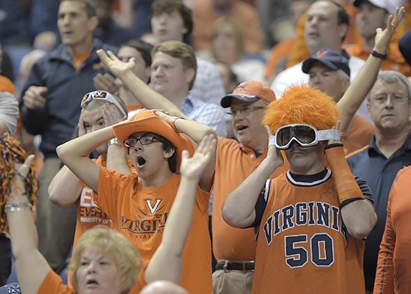 Virginia fans react as Florida State closes the score by 4 points in the second half during the ACC men’s basketball quarterfinals in Greensboro, North Carolina, on March 12, 2015.