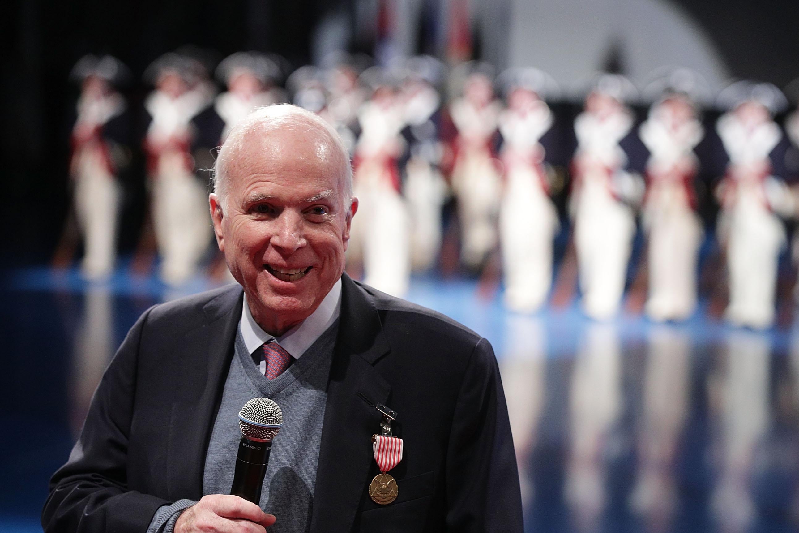 Sen. John McCain (R-AZ) speaks after he was presented with the Outstanding Civilian Service Medal during a special Twilight Tattoo performance November 14, 2017 at Fort Myer in Arlington, Virginia. Sen. McCain was honored for over 63 years of dedicated service to the nation and the U.S. Navy.  