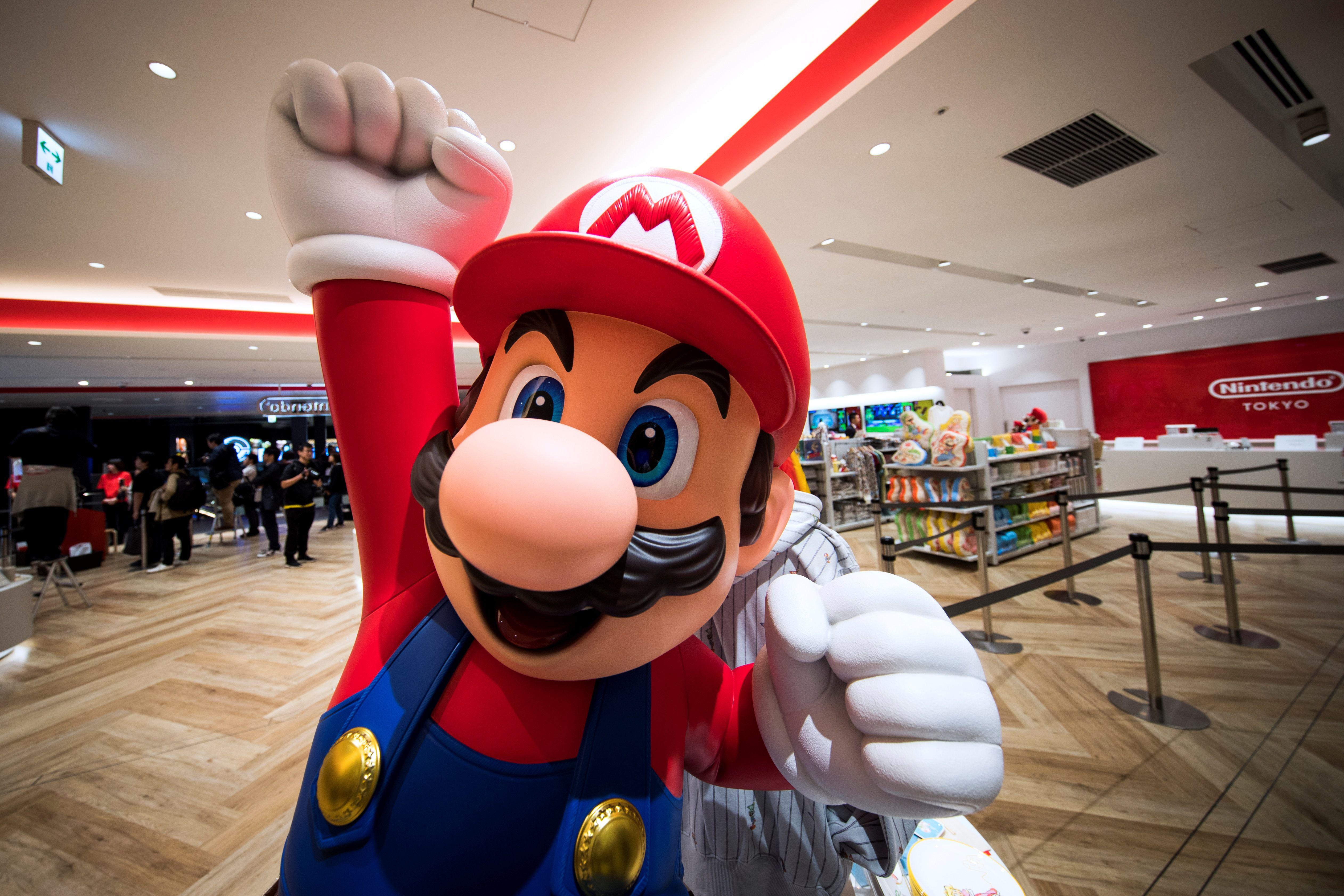 A Mario statue is seen at a Nintendo store. 