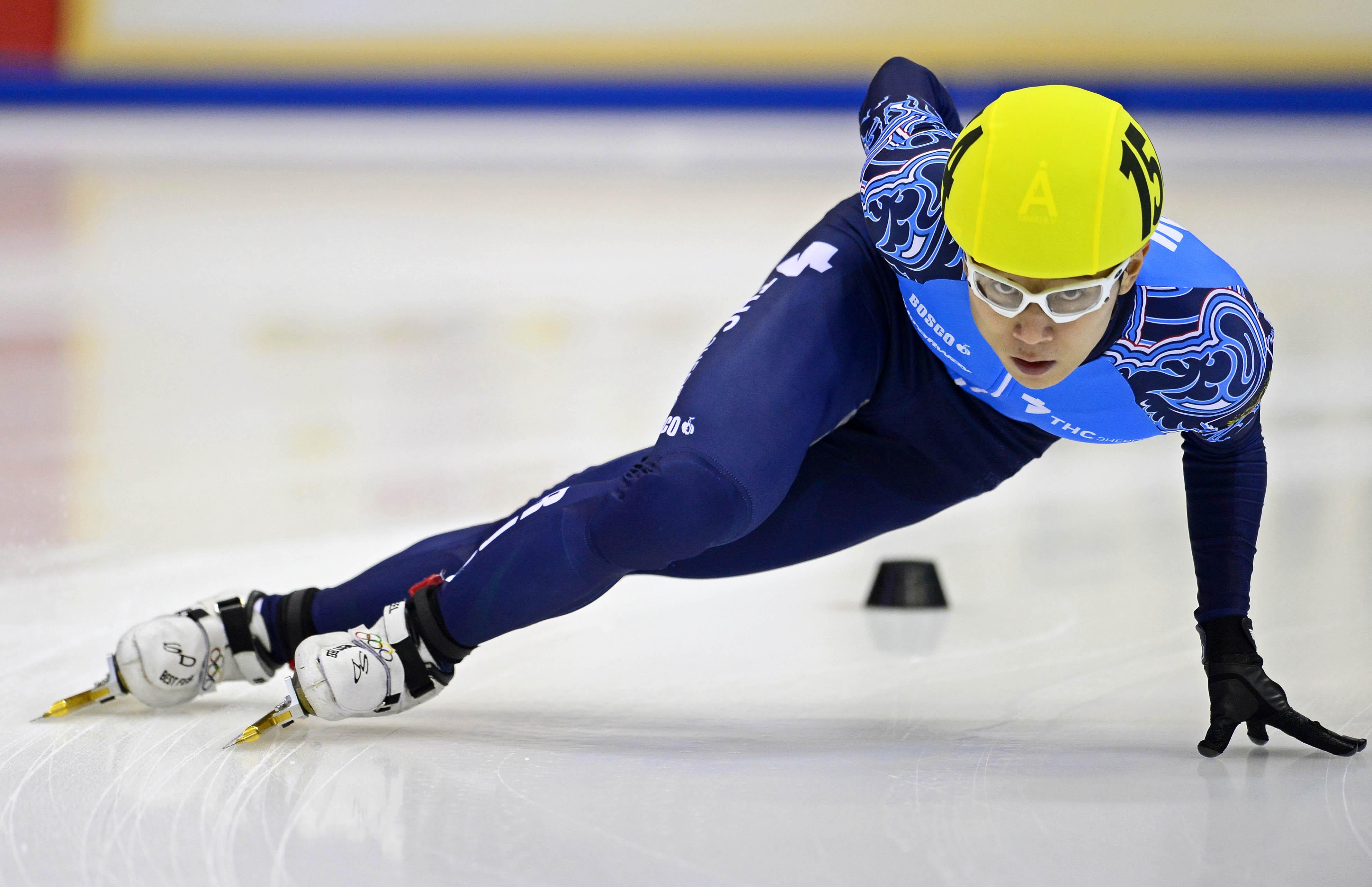 Victor An of Russia competes in the men's 1000m heat race of the ISU European Short Track speed skating Championships in Dresden, eastern Germany, on January 19, 2014. 