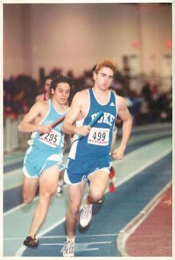 The author, on the left, runs a leg of the four-by-800-meter relay.
