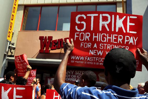 Employees and supporters demonstrate outside of a Wendy's fast-food restaurant to demand higher pay and the right to form a union on July 29, 2013 in New York City. 
