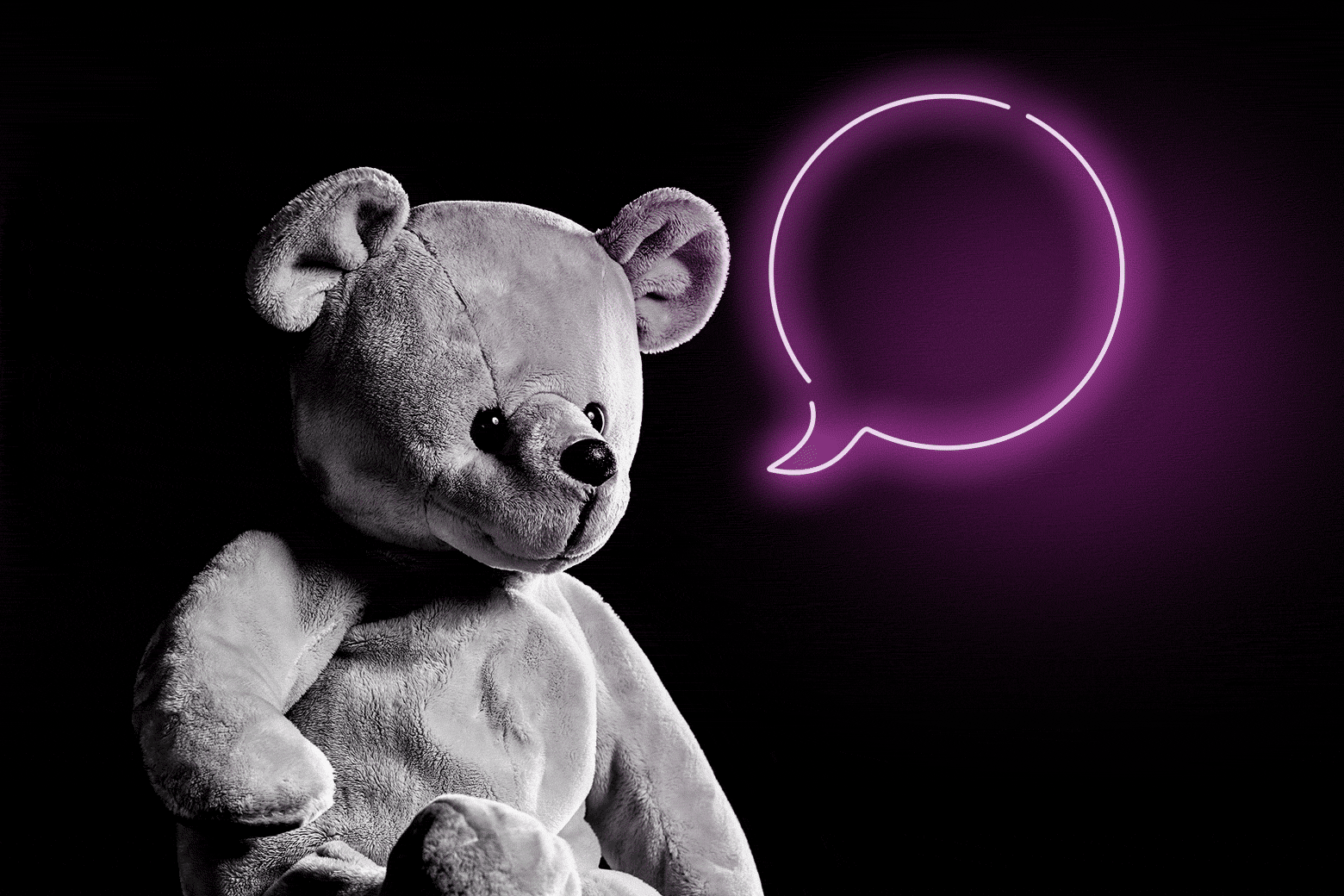 A teddy bear with a speech bubble. 