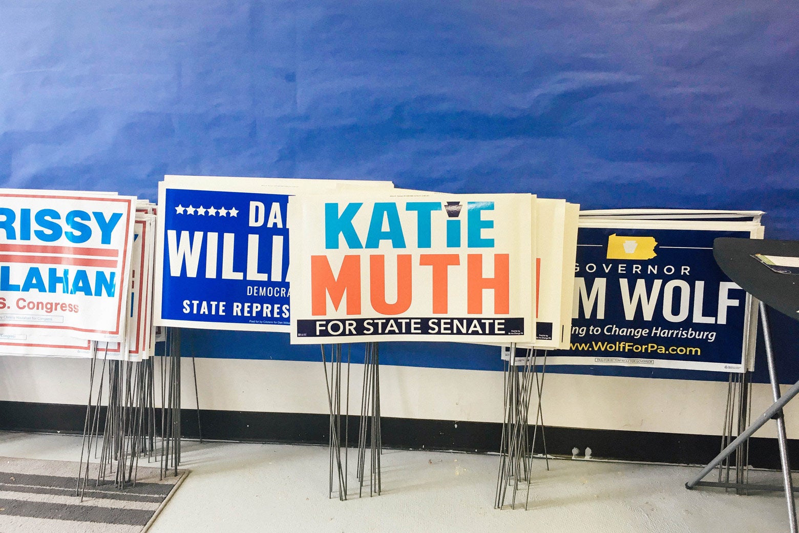 Katie Muth’s yard signs sit alongside those of fellow Democrats at her campaign office in Exton, Pennsylvania.