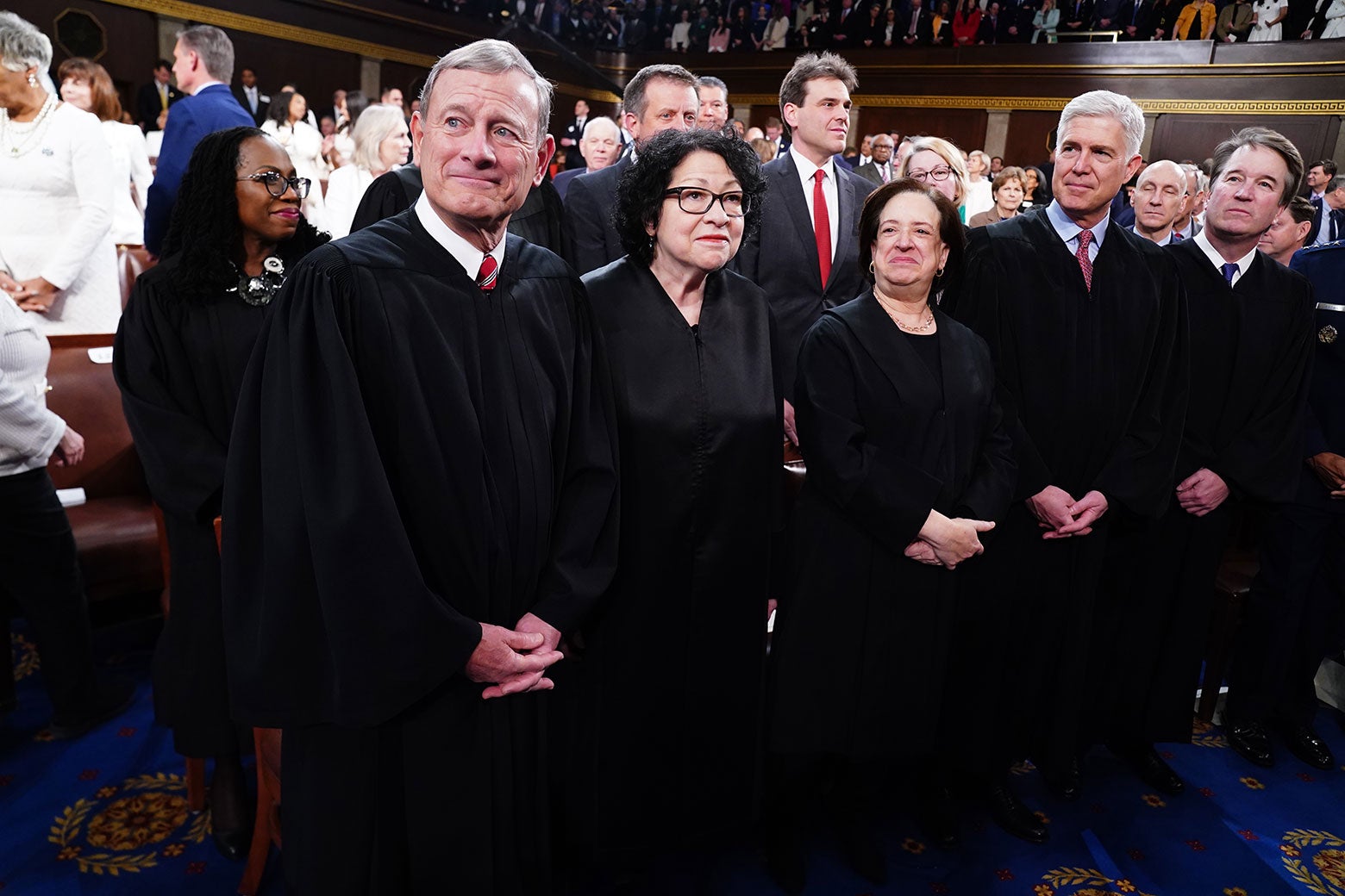 John Roberts, Sonia Sotomayor, Elena Kagan, Neil Gorsuch, and Brett Kavanaugh stand dressed in their black robes on the House floor ahead of the annual State of the Union address on March 7.