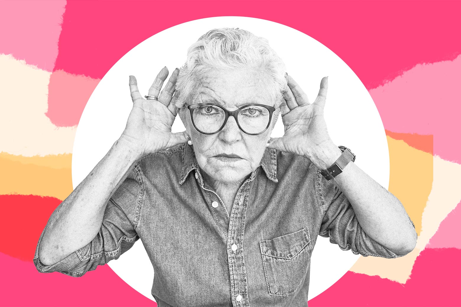 A woman in her 60s or 70s holding her hands up to her ears to try to hear better.