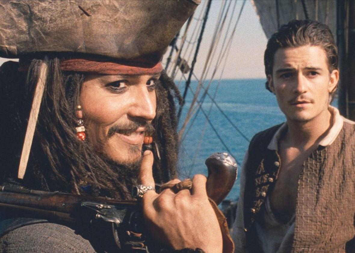 Johnny Depp and Orlando Bloom in Pirates of the Caribbean: The C