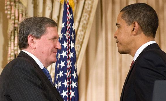US President Barack Obama shakes hands with Richard Holbrooke, newly named Special Envoy to Afghanistan and Pakistan, at the US State Department in Washington, DC, January 22, 2009. 