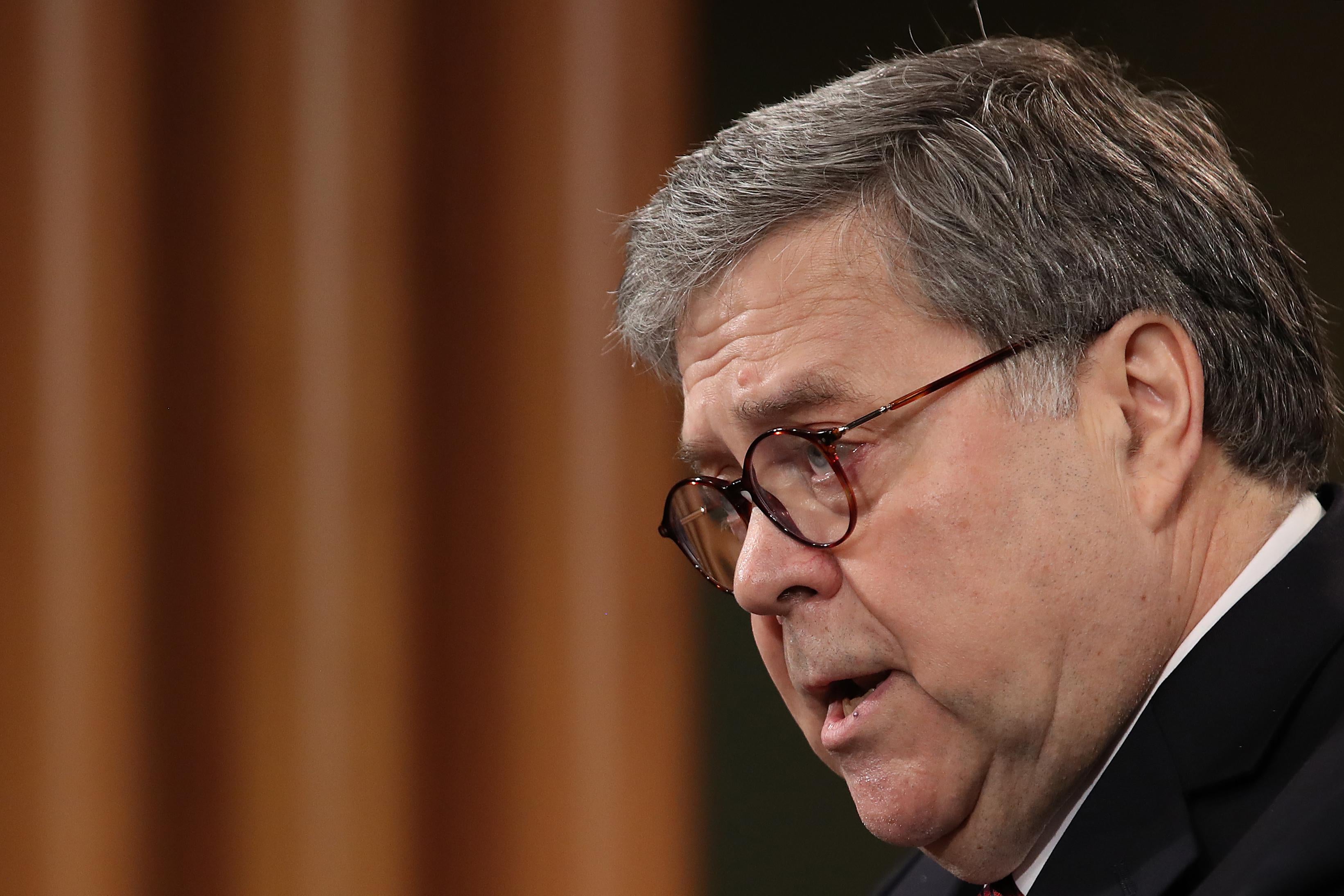 Attorney General William Barr speaks during a press conference on the release of the redacted version of the Mueller report at the Department of Justice on Thursday in Washington.