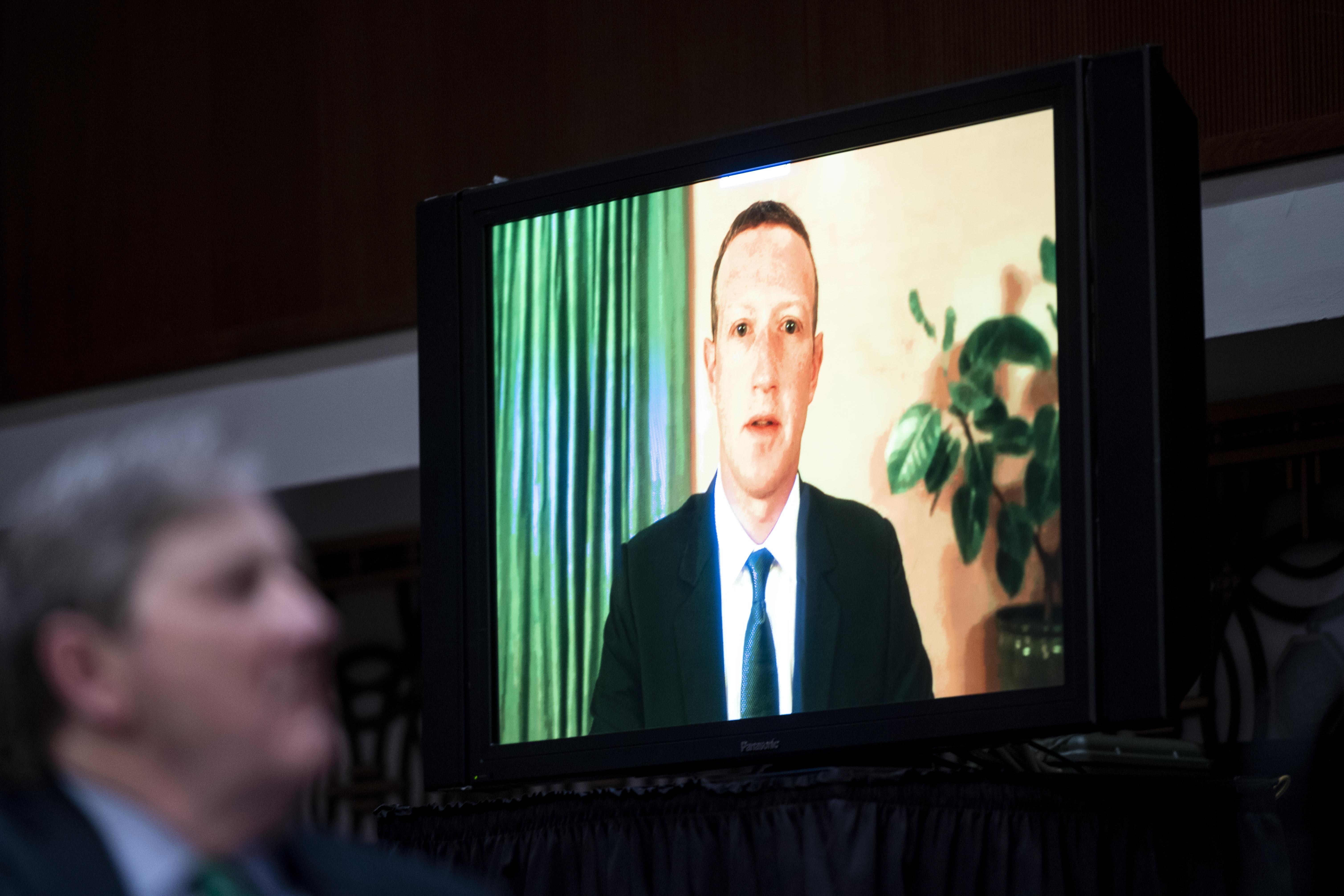 WASHINGTON, DC - NOVEMBER 17: Mark Zuckerberg, Chief Executive Officer of Facebook, testifies remotely as Sen. John Kennedy, R-La., looks on during the Senate Judiciary Committee hearing on "Breaking the News: Censorship, Suppression, and the 2020 Election" on November 17, 2020 in Washington, DC. Facebook CEO Mark Zuckerberg and Twitter CEO Jack Dorsey are scheduled to testify remotely.(Photo By Bill Clark-Pool/Getty Images)