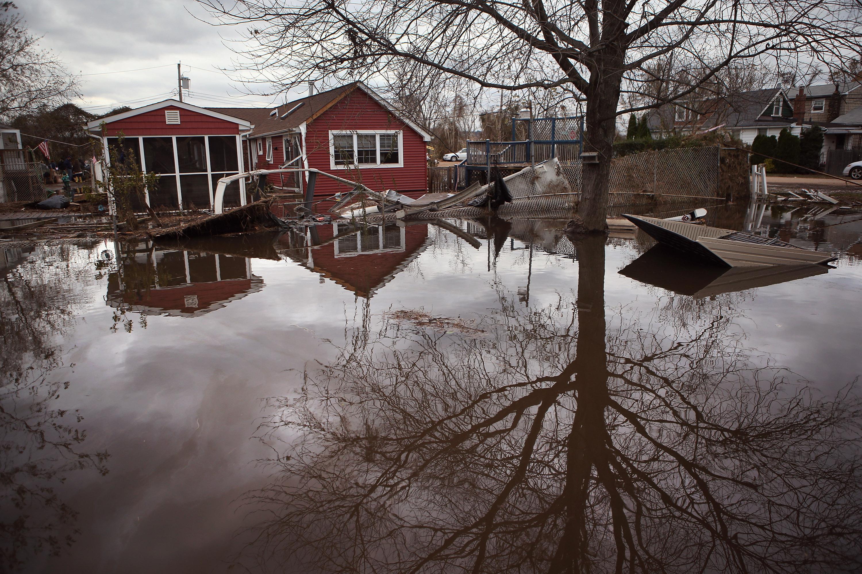 Water continues to flood a neighborhood on November 1, 2012 in the Ocean Breeze area of the Staten Island borough of New York City.