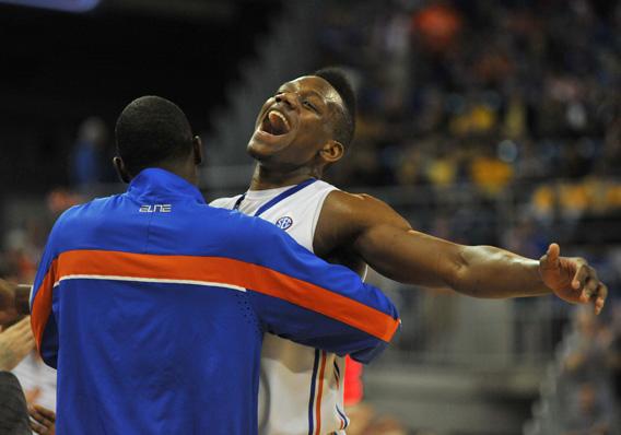 Forward Will Yeguete #15 of the Florida Gators celebrates a victory against the Missouri Tigers January 19, 2013 at Stephen C. O'Connell Center in Gainesville, Florida.