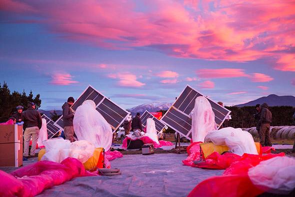 The Project Loon team prepares solar panels, electronics and balloon envelopes for launch as the sun rises in New Zealand. 