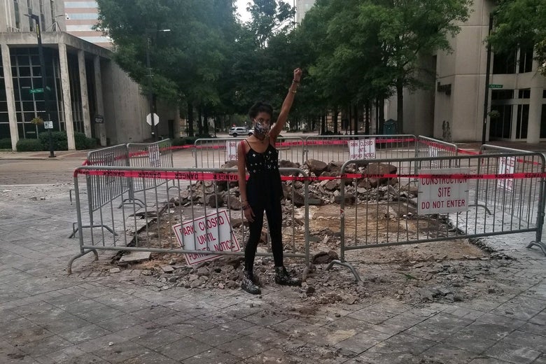 The story behind 50 cops in riot gear arresting 14 peaceful protesters in Alabama.
