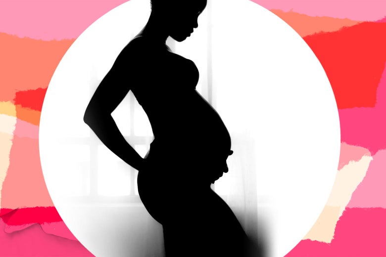 A silhouette of a pregnant woman
