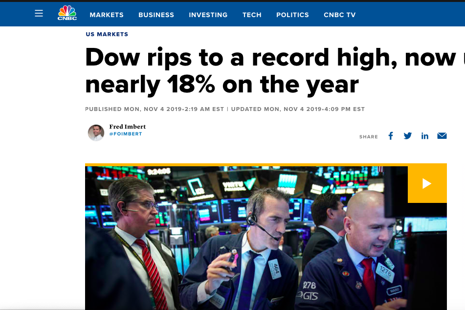 Screenshot of a news story titled "Dow rips to a record high, now up nearly 18% on the year."