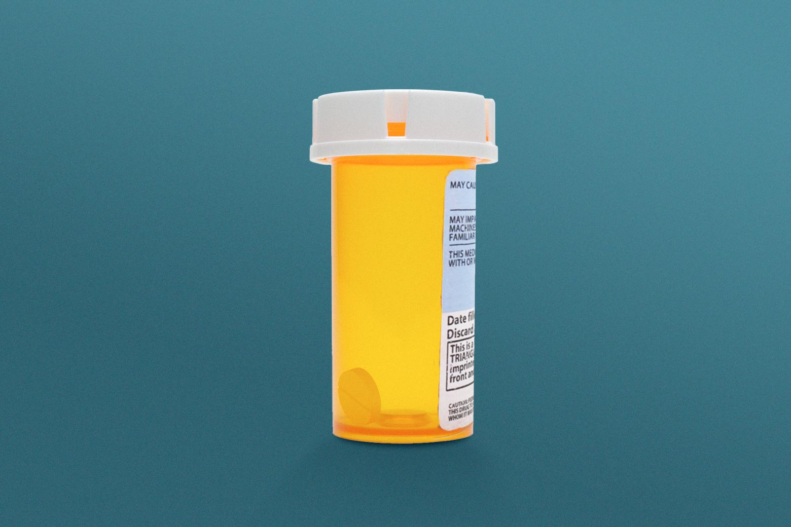 An almost empty pill bottle of Adderall.
