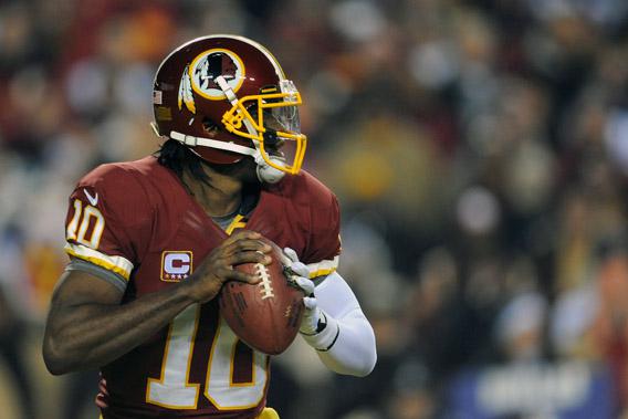 Robert Griffin III #10 of the Washington Redskins drops back to pass during their game against the Dallas Cowboys at FedExField on December 30, 2012 in Landover, Maryland.
