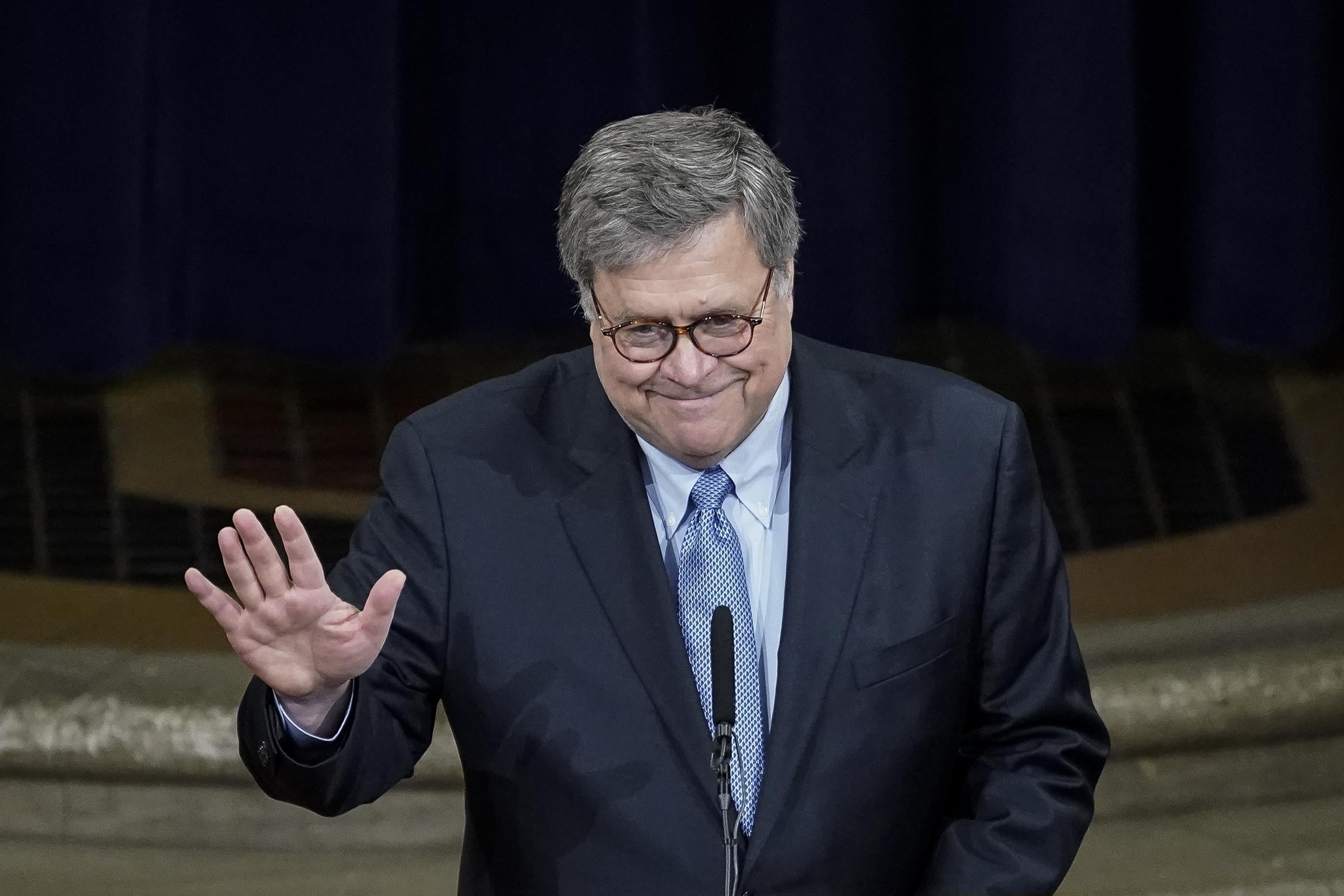 William Barr with his weasel grin.
