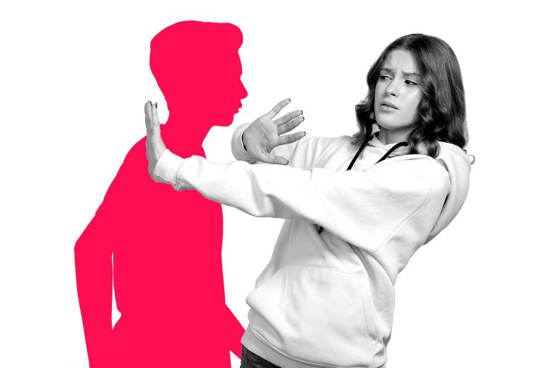 A woman holds out her hands in a blocking motion over an illustrated silhouette.
