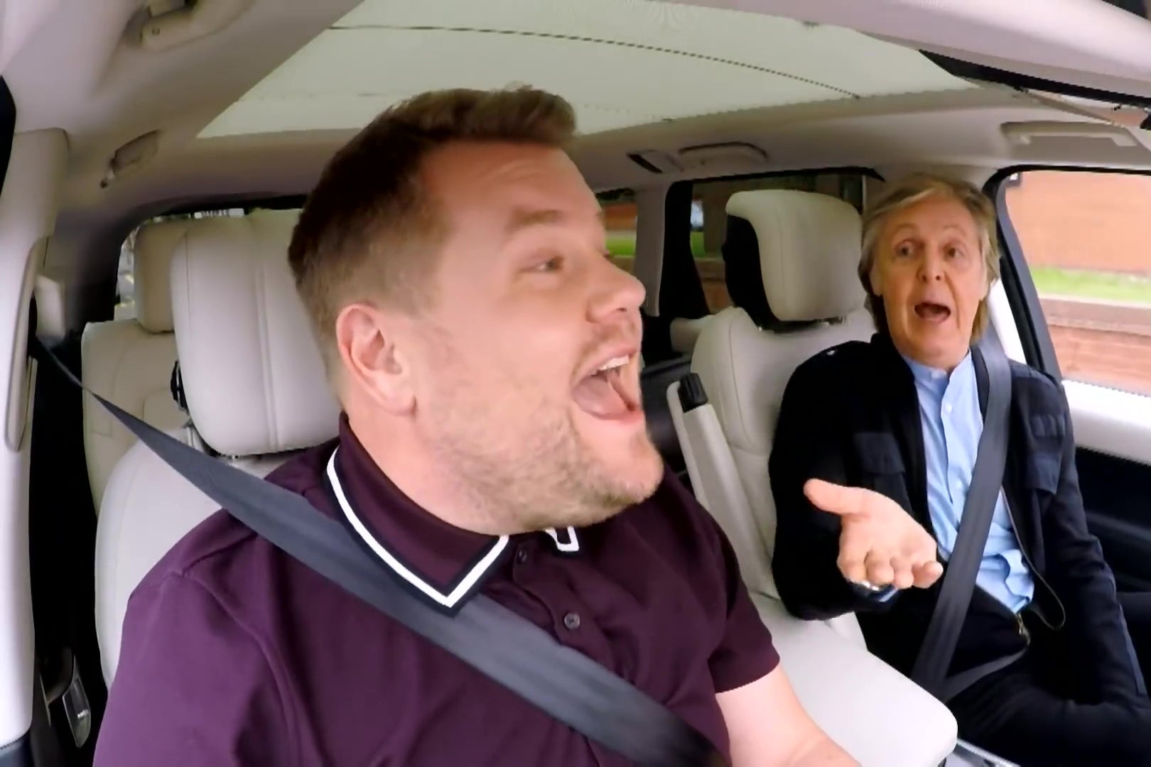 James Corden and Paul McCartney singing in a car.