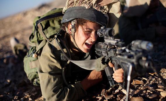 A female soldier from the 'Karakal' Battalion in action during training.