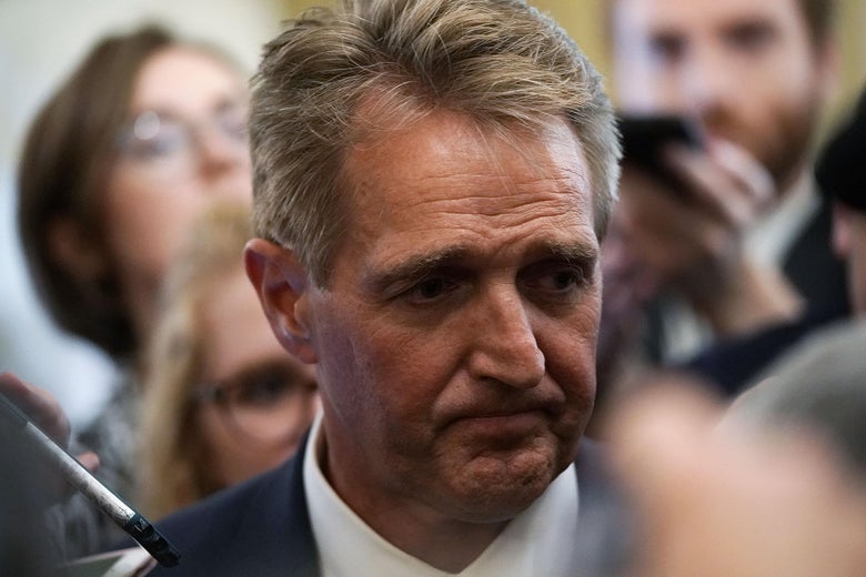 Republican Sen. Jeff Flake speaks to the press on September 28, 2018 at the U.S. Capitol in Washington, D.C.