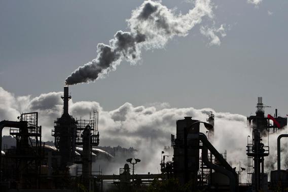 Smoke is released into the sky at the ConocoPhillips oil refinery in San Pedro, California March 24, 2012. 